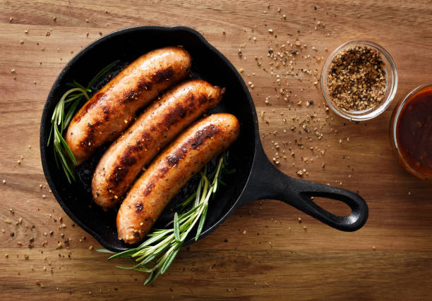 three cooked sausages