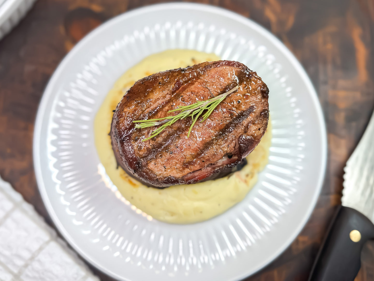 Bacon-Wrapped Tenderloin over Mashed potatoes 