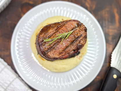 Bacon-Wrapped Tenderloin over Mashed potatoes 