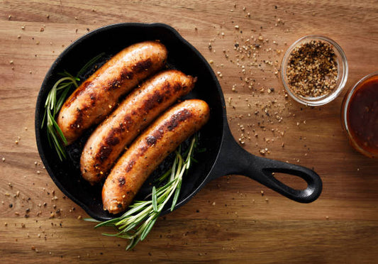 three cooked sausages